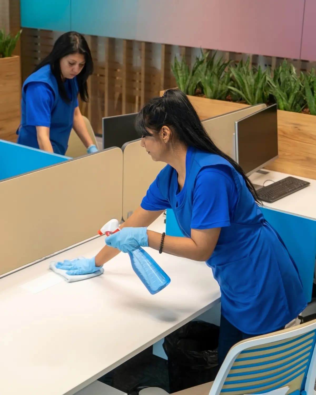 HomeBlu office cleaning crew detailing desks and shared spaces in a Fort Lauderdale suite